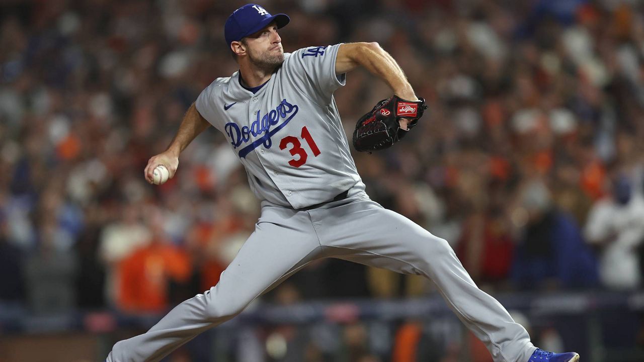 Los Angeles Dodgers' Max Scherzer pitches against the San Francisco Giants during the ninth inning of Game 5 of the NLDS on Thursday, Oct. 14, 2021, in San Francisco. (AP Photo/John Hefti)