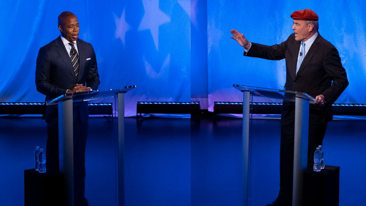Eric Adams and Curtis Sliwa faced off in the first mayoral debate. (AP Photo/Craig Ruttle, Pool)