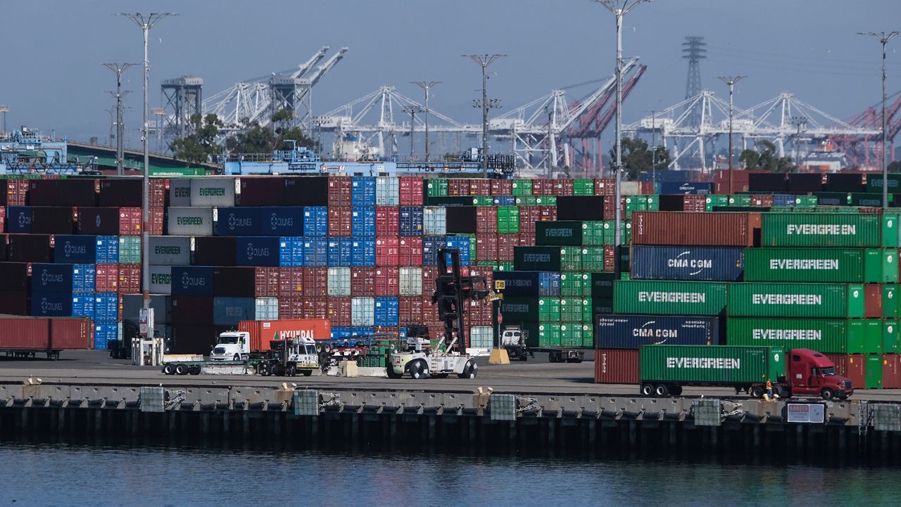 Cargo containers sit stacked at the Port of Los Angeles, Oct. 20, 2021 in San Pedro, Calif. (AP Photo/Ringo H.W. Chiu)