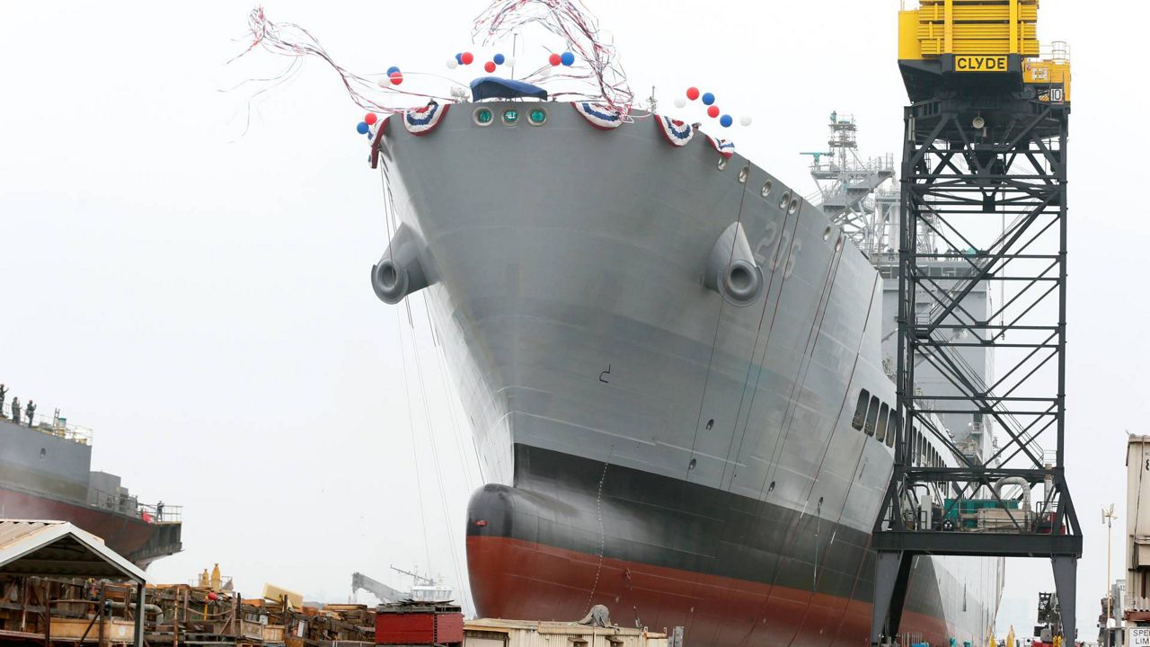 The U.S. Navy launches the USNS Harvey Milk, a fleet replenishment oiler ship named after the first openly gay elected official, in San Diego, Saturday, Nov. 6, 2021. (AP Photo/Alex Gallardo)
