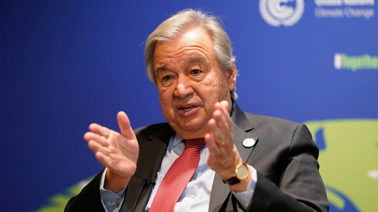 U.N. Secretary-General Antonio Guterres gestures during an interview at the COP26 U.N. Climate Summit in Glasgow, Scotland, on Thursday. (AP Photo/Alberto Pezzali)