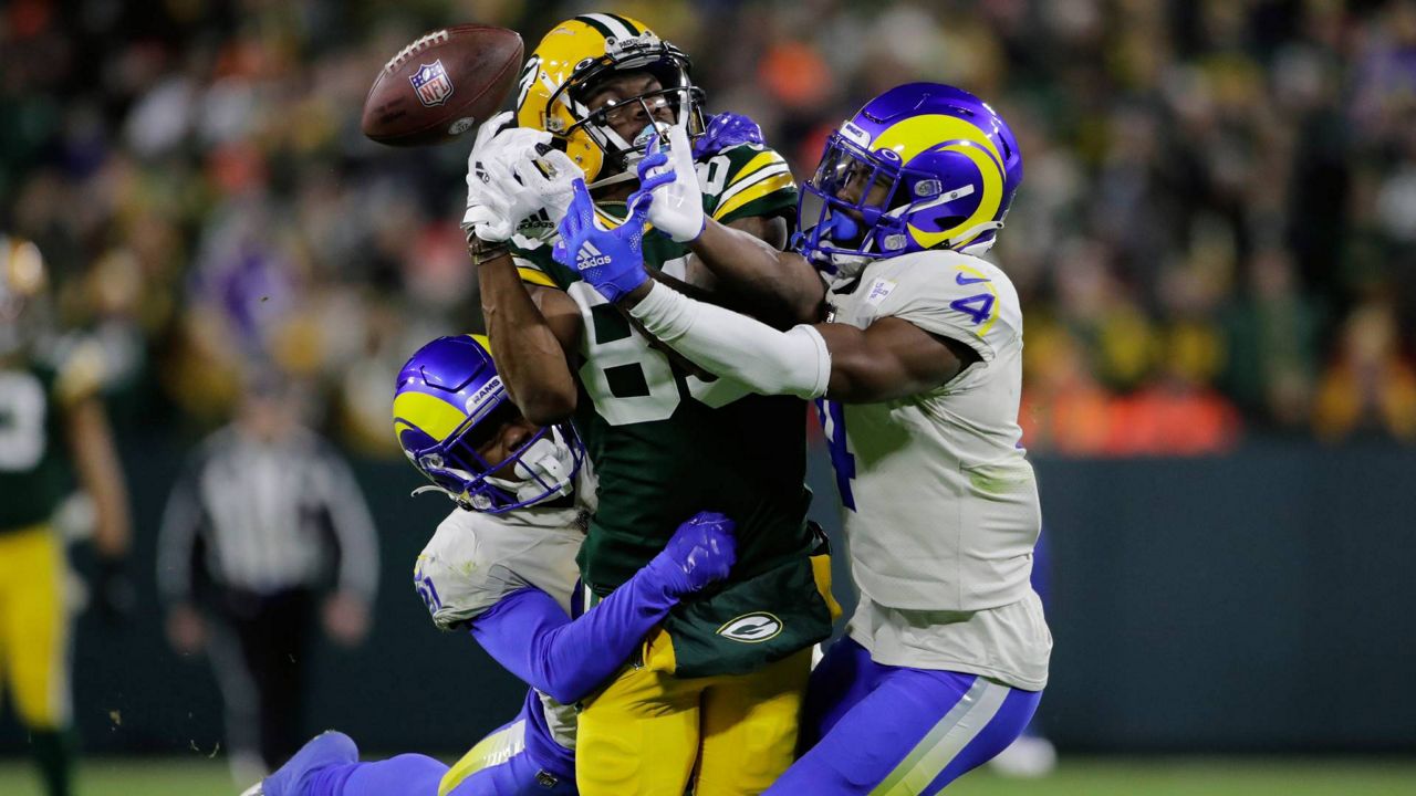 Charles Woodson honored during halftime of Packers game