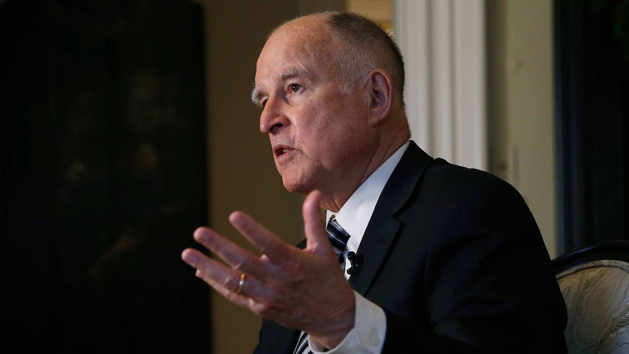 FILE - Then-California Gov. Jerry Brown talks during an interview in Sacramento, Calif., on Dec. 18, 2018. When former Gov. Brown signed the nation's first law requiring that women sit on corporate boards of publicly traded companies, he suggested it might not survive legal challenges. (AP Photo/Rich Pedroncelli, File)