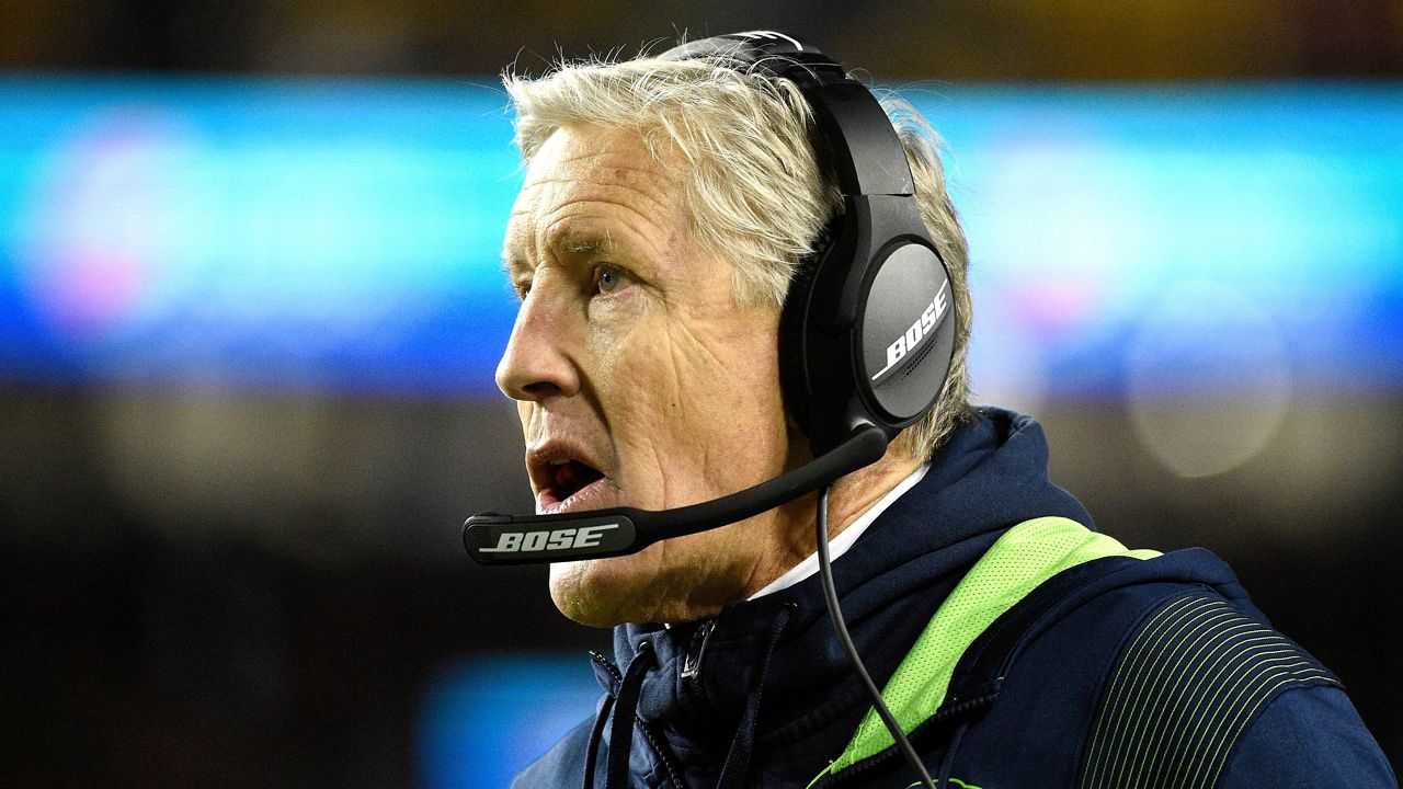 Seattle Seahawks coach Pete Carroll walks the sideline during a game between against the Washington Football Team on Nov. 29, 2021, in Landover, Md. (AP Photo/Mark Tenally)