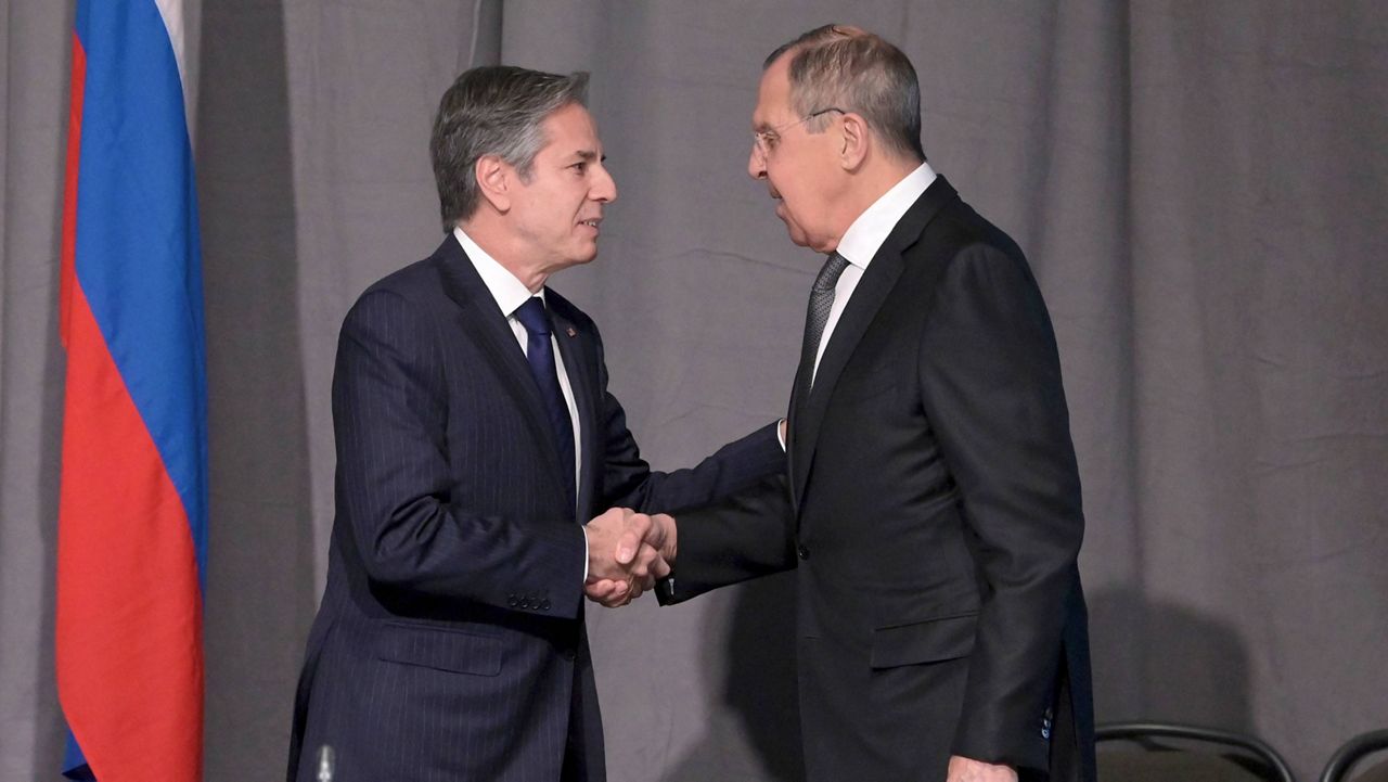 U.S. Secretary of State Antony Blinken, left, and Russian Foreign Minister Sergey Lavrov shake hands Thursday in Stockholm. (Jonathan Nackstrand/Pool Photo via AP)