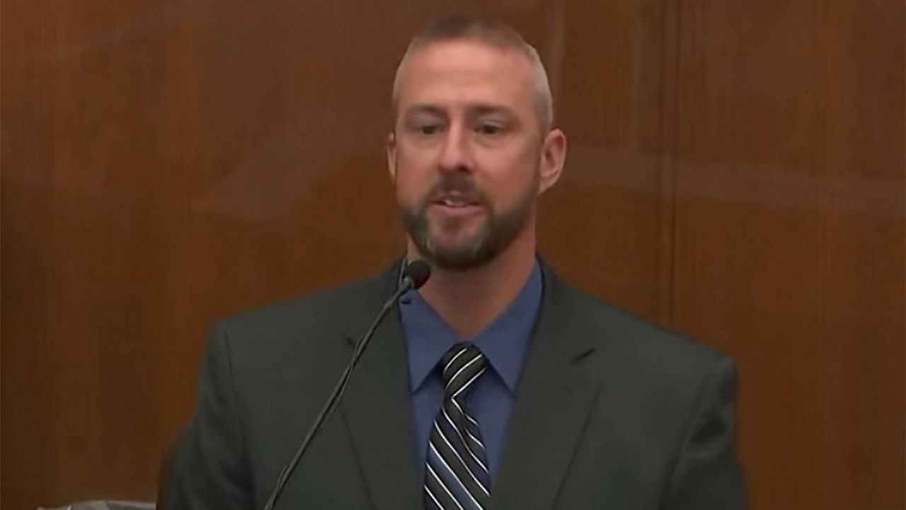 In this screen grab from video, Mychal Johnson, former patrol sergeant at the Brooklyn Center Police Department, testifies Friday in the trial of former Brooklyn Center police Officer Kim Potter in Minneapolis. (Court TV, via AP, Pool)