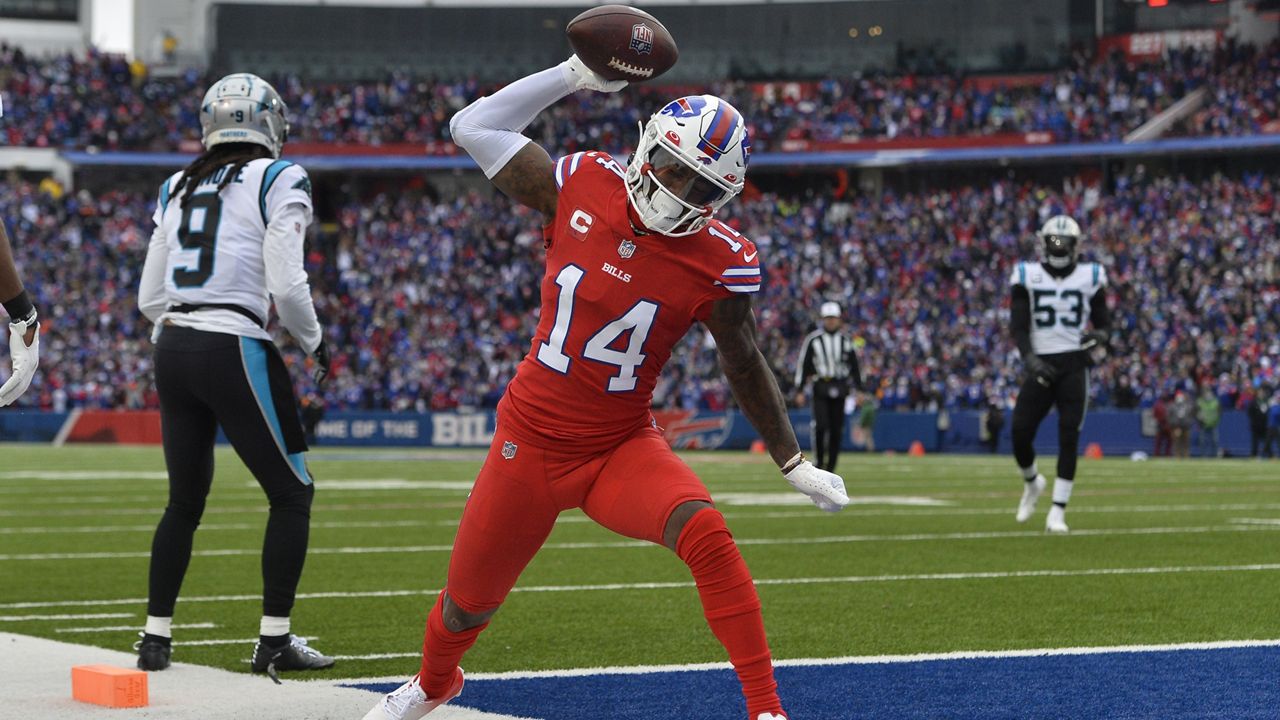 Buffalo Bills wide receiver Stefon Diggs (14) celebrates after scoring a touchdown in the first half of an NFL football game against the Carolina Panthers, Sunday, Dec. 19, 2021, in Orchard Park, N.Y. (AP Photo/Adrian Kraus)