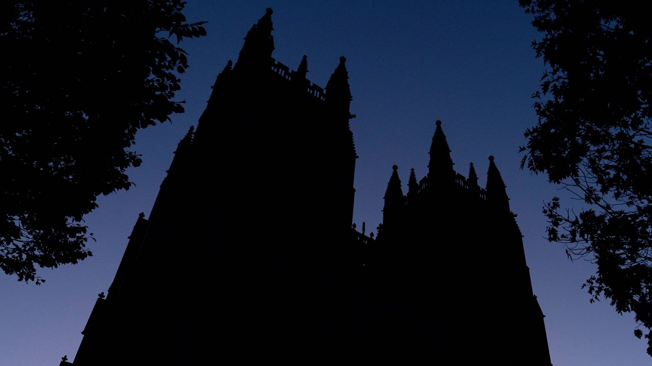 FILE - The Washington National Cathedral is seen at dawn. (AP Photo/Andrew Harnik)