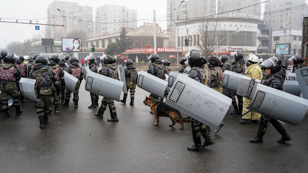 Riot police gather to block demonstrators during a protest in Almaty, Kazakhstan, Wednesday. (AP Photo/Vladimir Tretyakov)