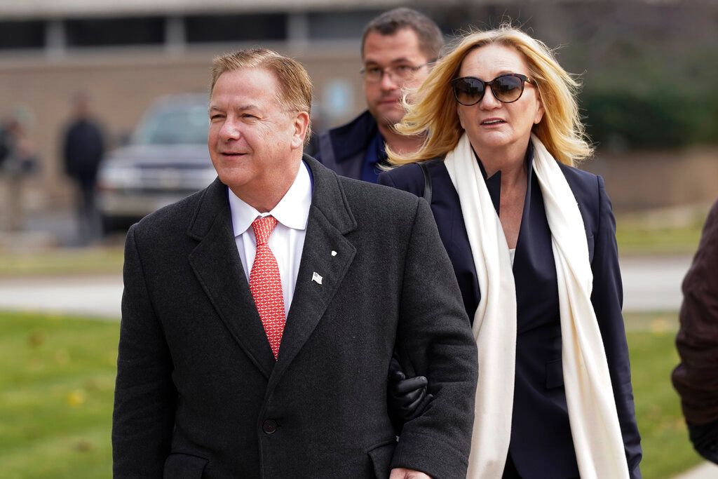 Mark McCloskey, a Republican candidate for U.S. Senate in Missouri, and his wife, Patricia McCloskey, walk outside the Kenosha County Courthouse, Tuesday, Nov. 16, 2021, in Kenosha, Wis. (AP Photo/Paul Sancya, File)