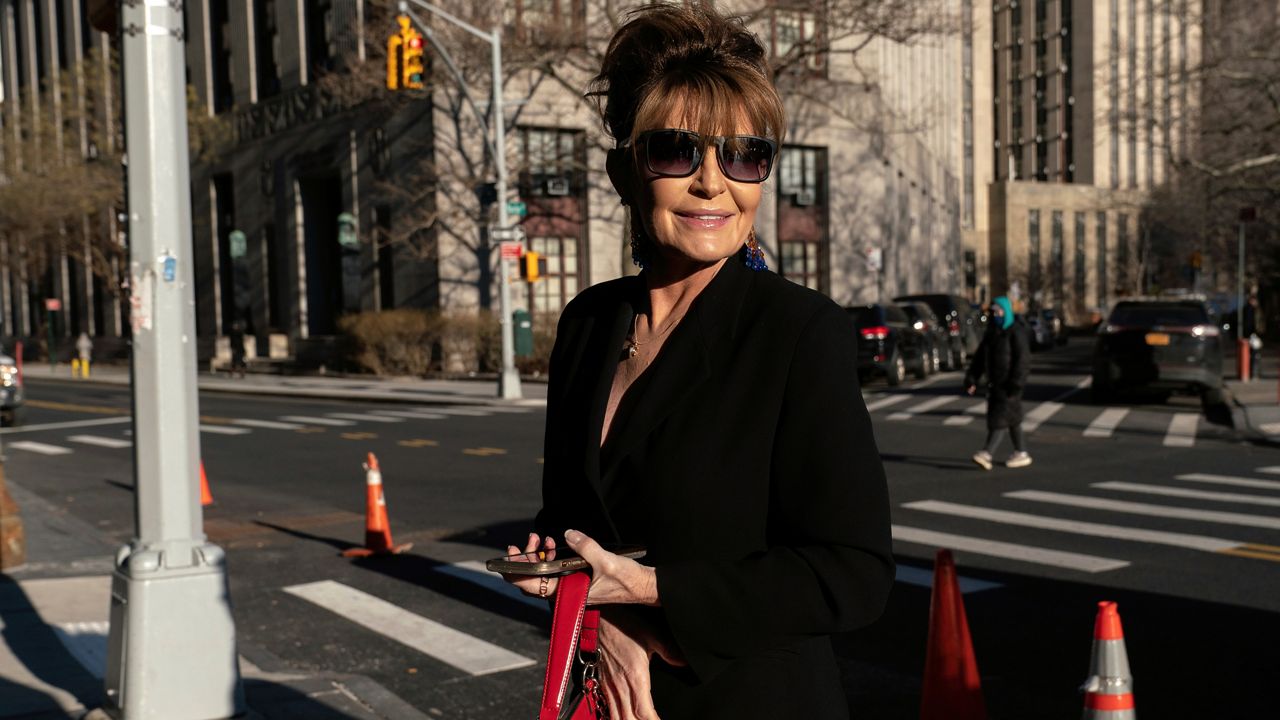 Former Alaska Gov. Sarah Palin arrives to Federal court in New York City on Friday, Feb. 11, 2022. (AP Photo/Jeenah Moon)