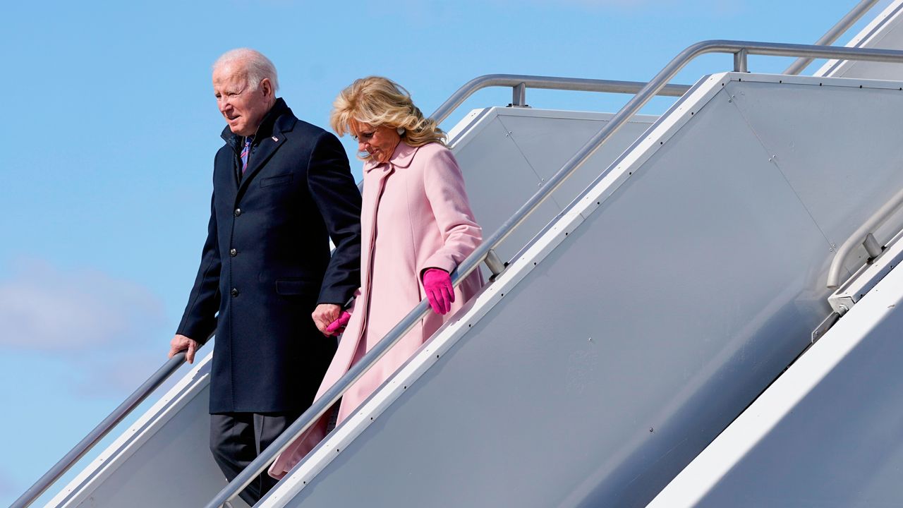 FILE: President Joe Biden and first lady Jill Biden step off Air Force One at Duluth International Airport, Wednesday, March 2, 2022, in Duluth, Minn. Biden is en route to nearby Superior, Wis., to promote his infrastructure agenda. (AP Photo/Patrick Semansky)
