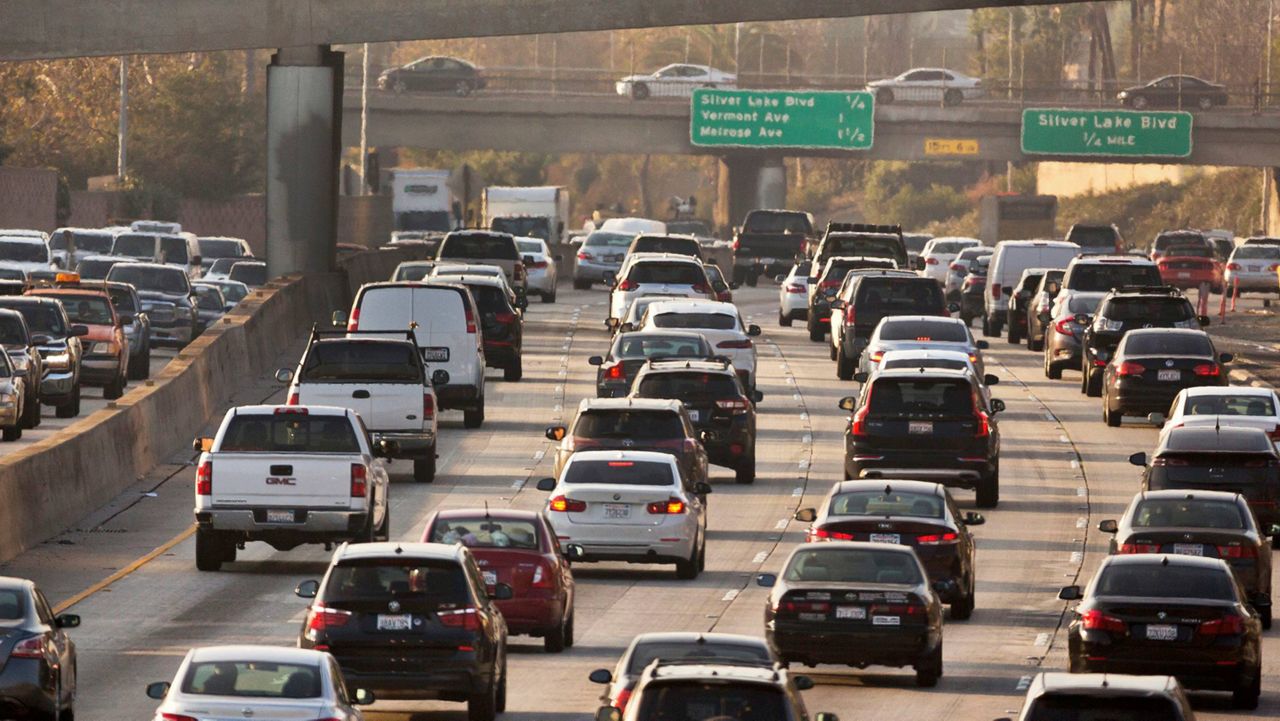 This Dec. 12, 2018, file photo shows traffic on the Hollywood Freeway in Los Angeles. (AP Photo/Damian Dovarganes, File)