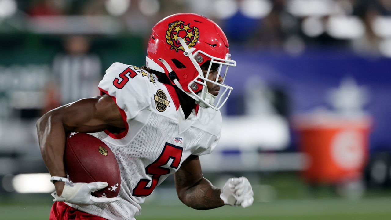 New Jersey Generals KaVontae Turpin wide receiver (5) carries the ball against the Birmingham Stallions during the second half of a USFL football game Saturday, April 16, 2022, in Birmingham, Ala. (AP Photo/Butch Dill)