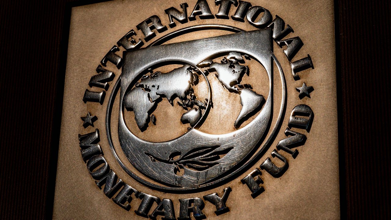 The logo of the International Monetary Fund is visible on their building in Washington. (AP Photo/Andrew Harnik) 