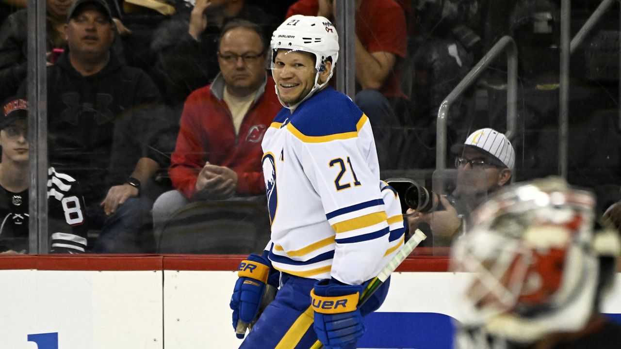 Buffalo Sabres right wing Kyle Okposo (21) skates wearing a Hockey