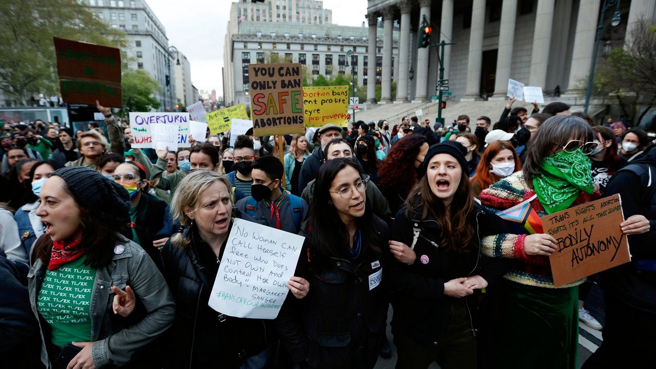 Protesters rally in support of abortion rights, Tuesday, May 3, 2022, in New York. (AP Photo/Jason DeCrow)