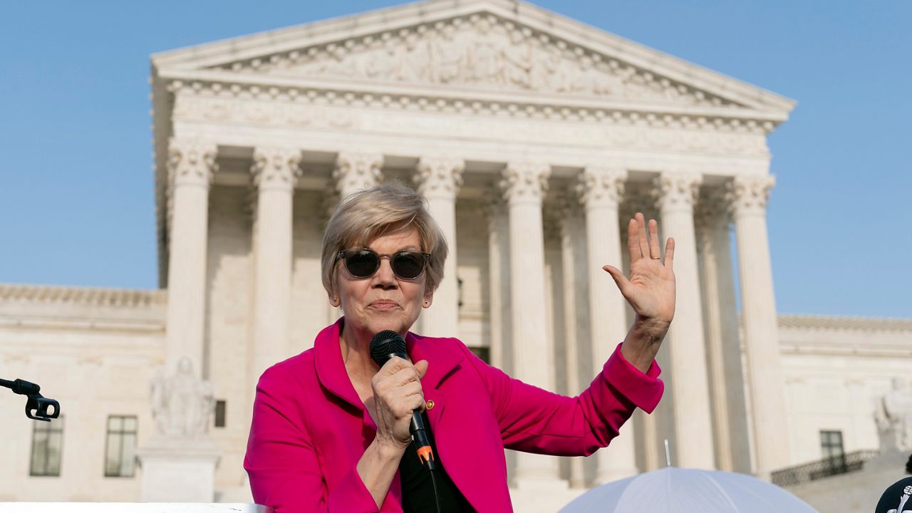 Sen. Elizabeth Warren, D-Mass., speaks outside of the U.S. Supreme Court Tuesday, May 3, 2022 in Washington. (AP Photo/Jose Luis Magana)
