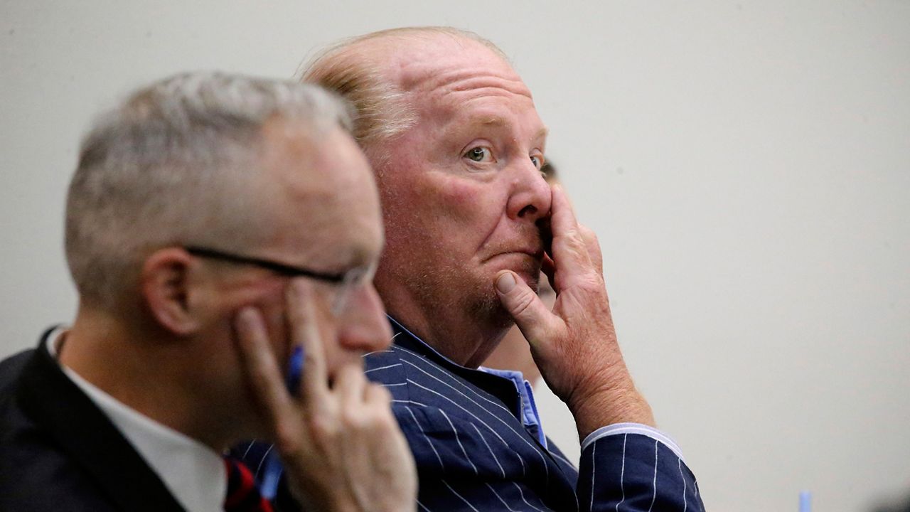 Celebrity chef Mario Batali listens during testimony at Boston Municipal Court on the second day of his sexual misconduct trial on Tuesday, May 10, 2022 in Boston. (Stuart Cahill/The Boston Herald via AP, Pool)