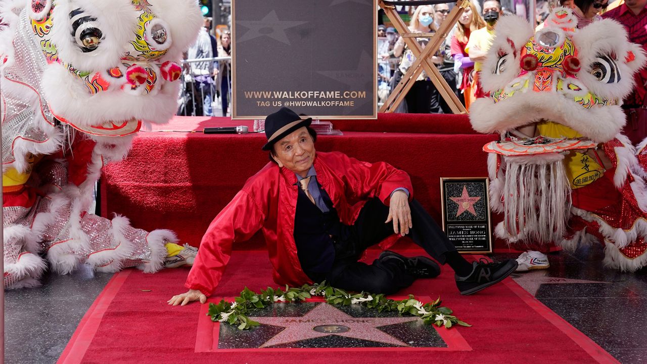 Actor James Hong poses after being honored with a star on the Hollywood Walk of Fame during a ceremony for him Tuesday in the Hollywood section of Los Angeles. (AP Photo/Mark J. Terrill)