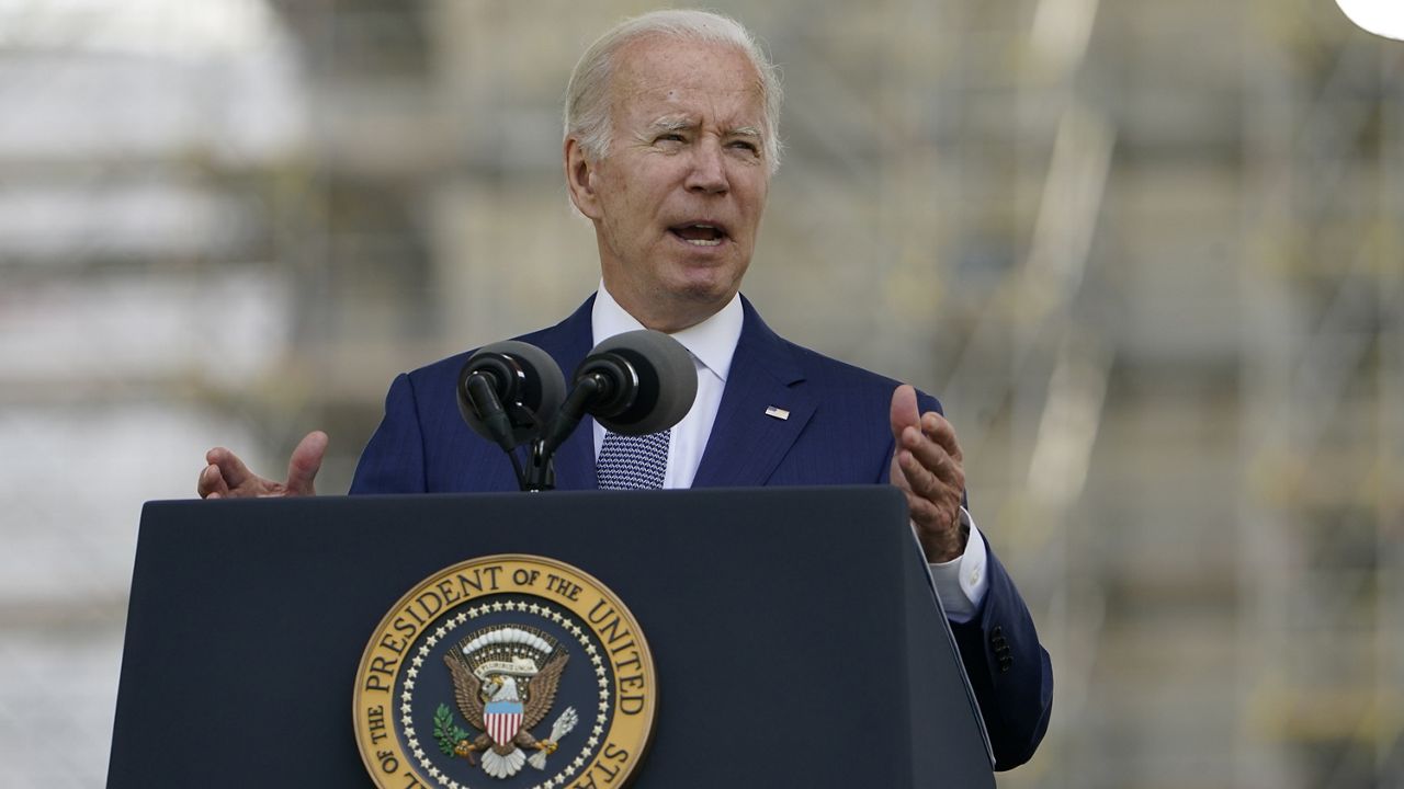 President Joe Biden speaks at the National Peace Officers' Memorial Service on the West Front of the Capitol in Washington, Sunday, May 15, 2022, honoring the law enforcement officers who lost their lives in the line of duty in 2021. (AP Photo/Manuel Balce Ceneta)