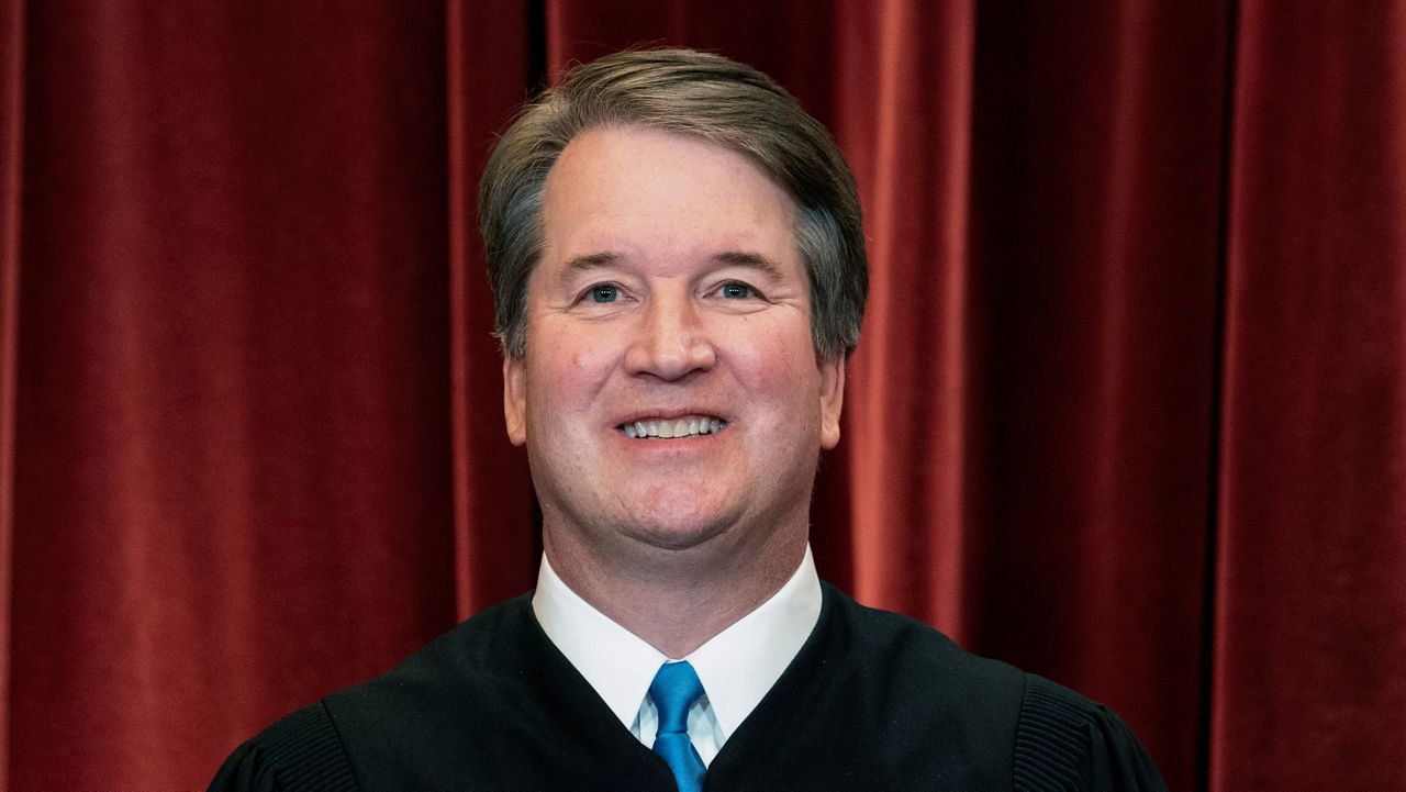 FILE - Associate Justice Brett Kavanaugh stands during a group photo at the Supreme Court in Washington, on April 23, 2021. (Erin Schaff/The New York Times via AP, Pool)