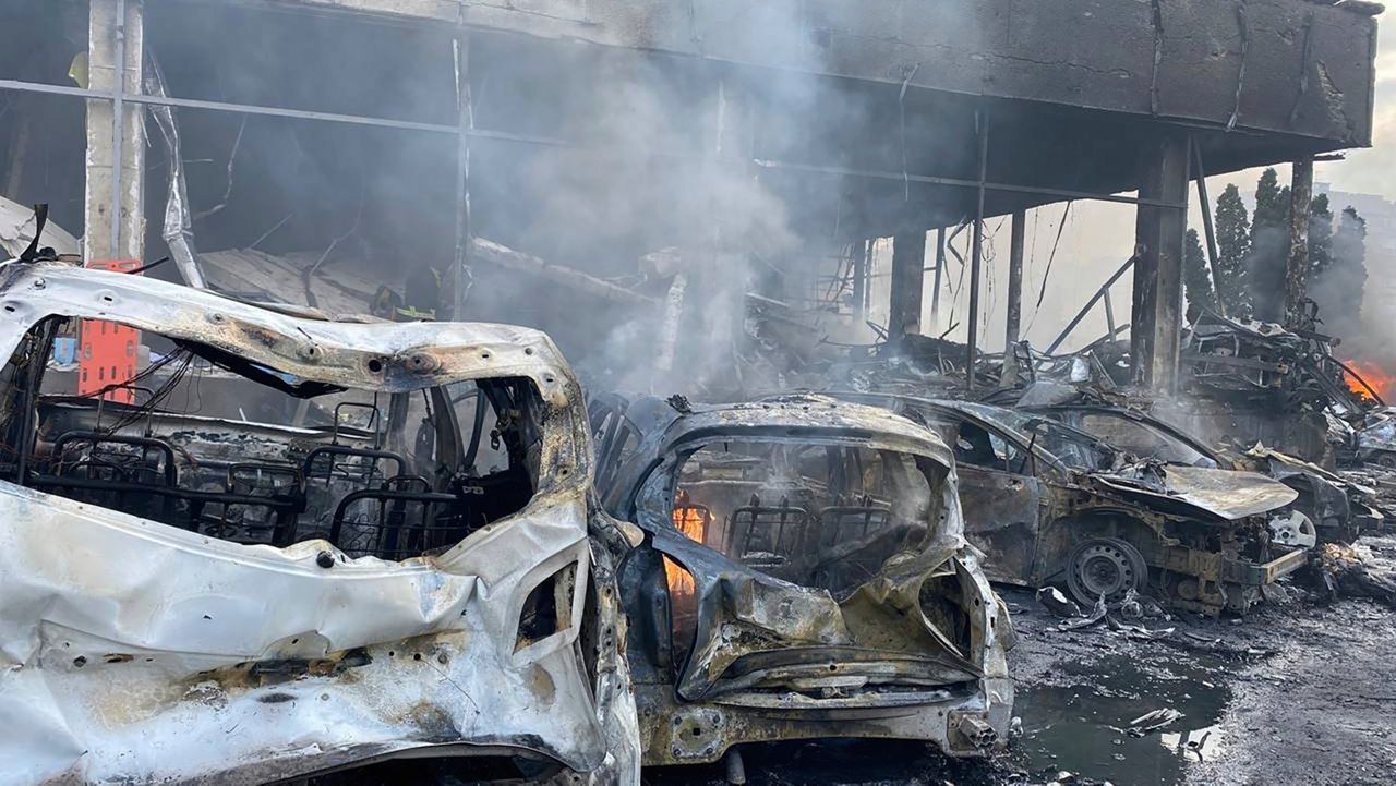 In this photo provided by the Ukrainian Emergency Service, a view of vehicles damaged by shelling in Vinnytsia, Ukraine, Thursday, July 14, 2022. (Ukrainian Emergency Service via AP)