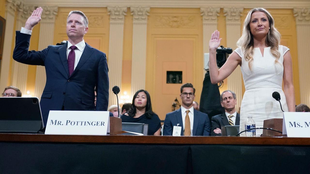 Matt Pottinger, former deputy national security adviser, and Sarah Matthews, former White House deputy press secretary, are sworn in to testify as the House select committee investigating the Jan. 6 attack on the U.S. Capitol holds a hearing at the Capitol in Washington, Thursday, July 21, 2022. (AP Photo/Patrick Semansky)