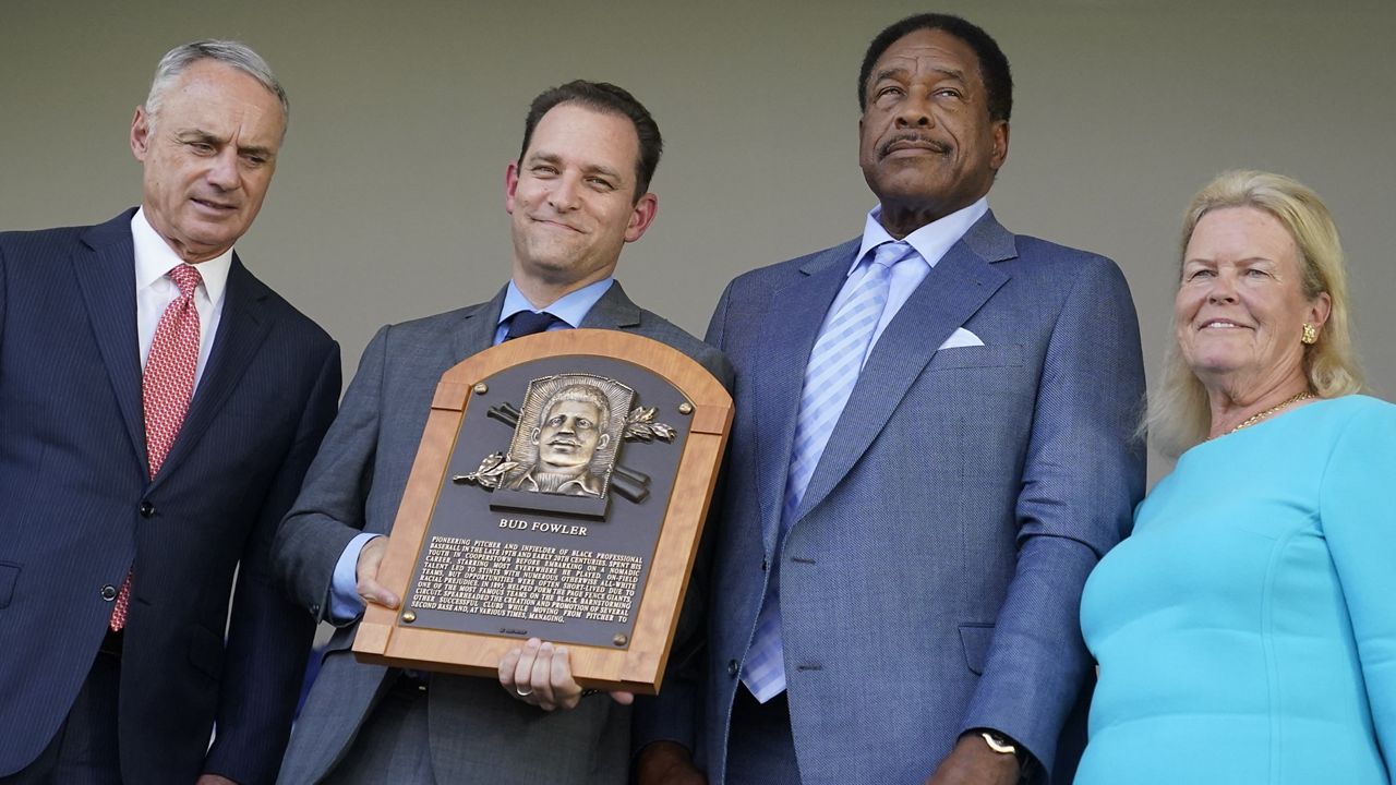 Buck O'Neil and Bud Fowler, Negro League baseball players, earn