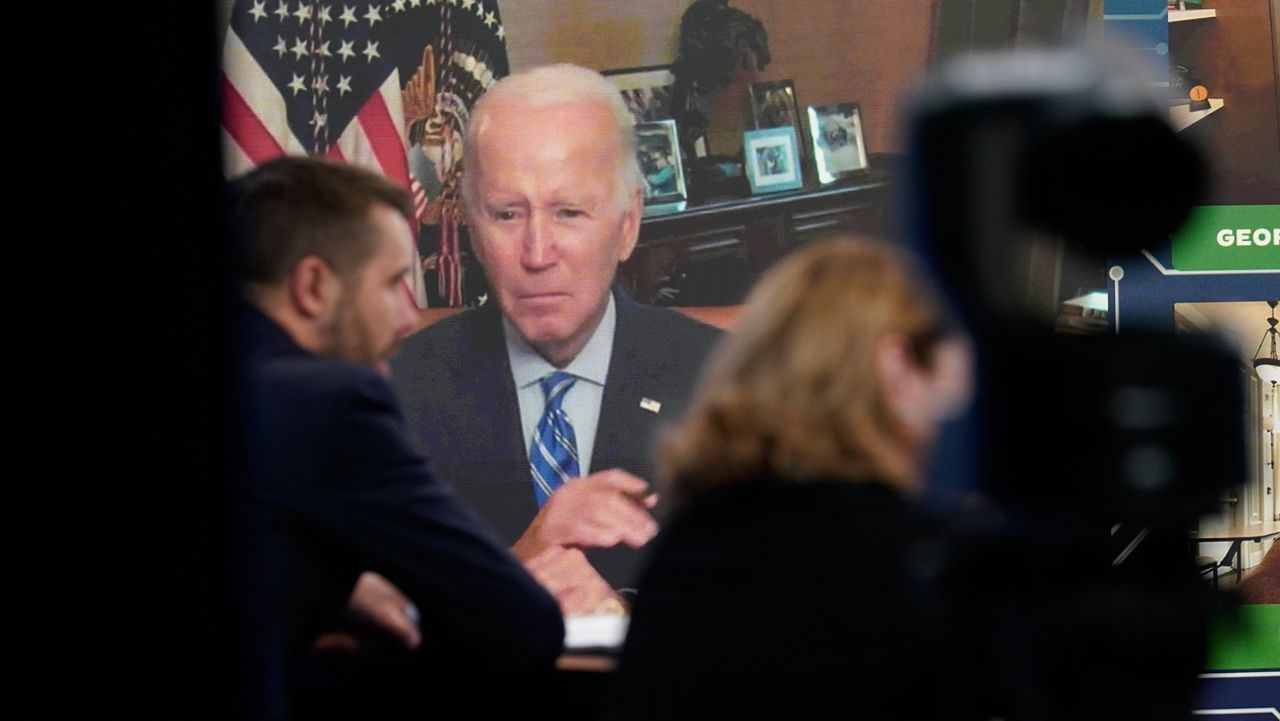 President Joe Biden listens as he attends virtually an event in the South Court Auditorium on the White House complex in Washington, Monday, July 25, 2022. (AP Photo/Susan Walsh)