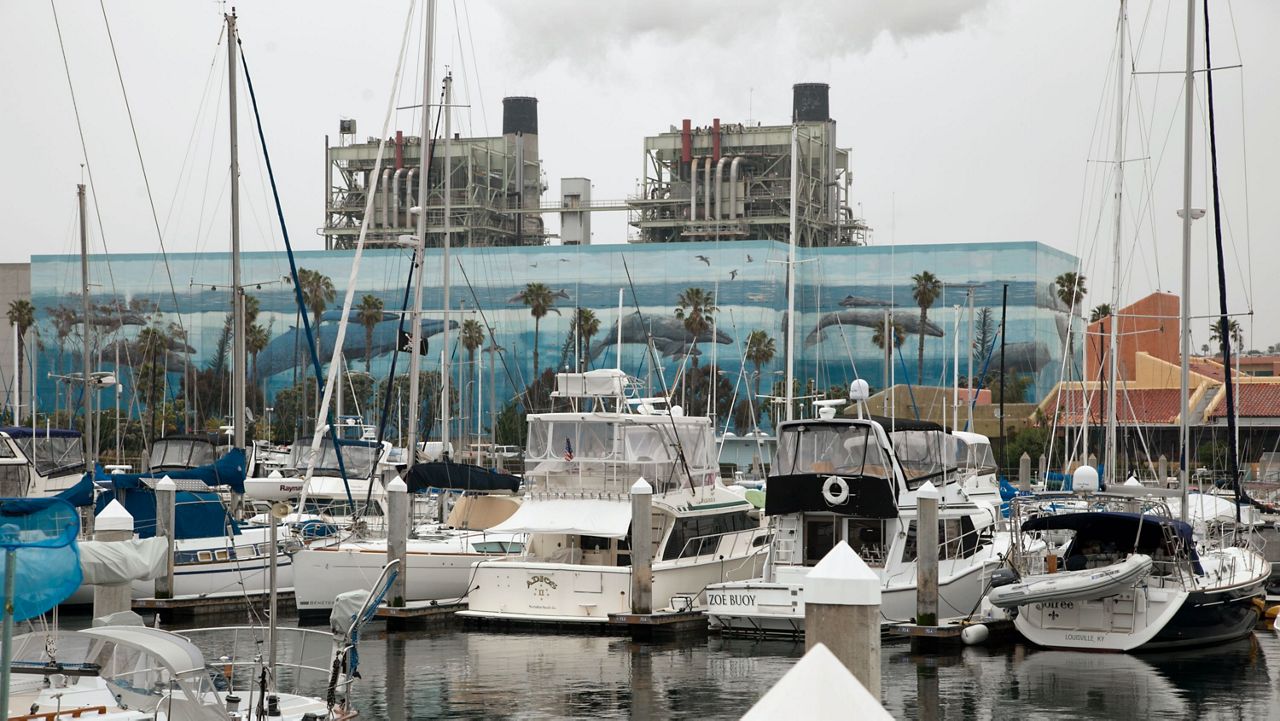 The "Whaling Wall" mural is seen on the AES Power Generating Plant in Redondo Beach, Calif., on Monday, April 30, 2012. (AP Photo/Damian Dovarganes, File)