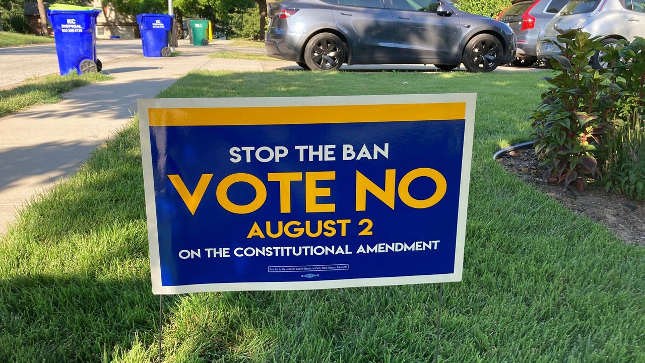 FILE - In this photo from Thursday, July 14, 2022, a sign in a yard in Merriam, Kansas, urges voters to oppose a proposed amendment to the Kansas Constitution to allow legislators to further restrict or ban abortion. (AP Photo/John Hanna)