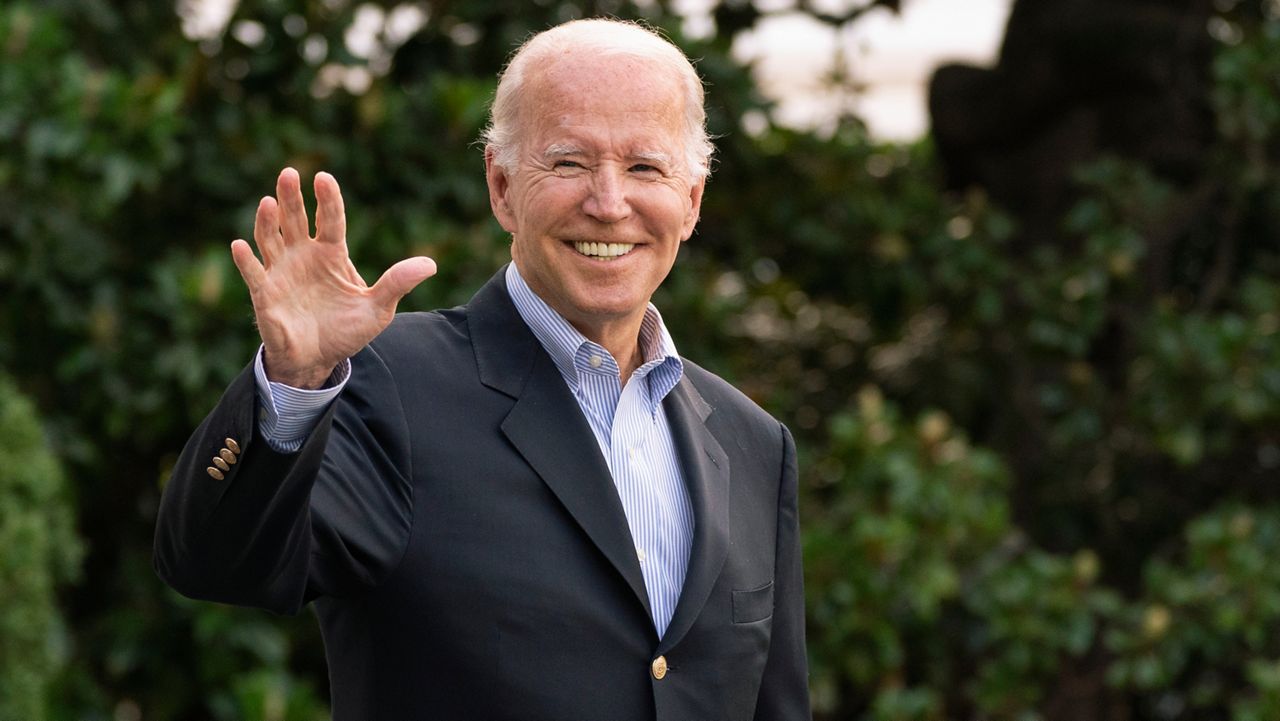 President Joe Biden waves as he walk to board Marine One on the South Lawn of the White House in Washington, on his way to his Rehoboth Beach, Del., home after his most recent COVID-19 isolation, Sunday, Aug. 7, 2022. (AP Photo/Manuel Balce Ceneta)