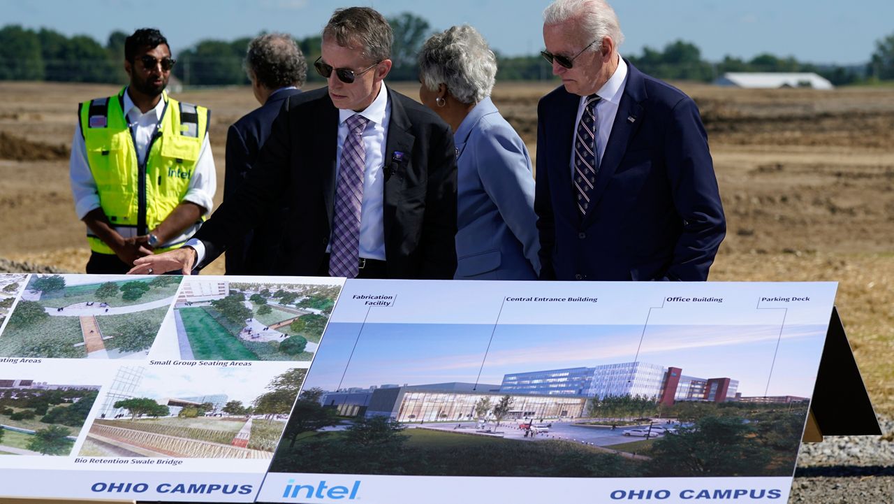 President Joe Biden listens as Intel CEO Pat Gelsinger speaks at the groundbreaking of the new Intel semiconductor manufacturing facility in New Albany, Ohio, Friday, Sep. 9, 2022. (AP Photo/Manuel Balce Ceneta)
