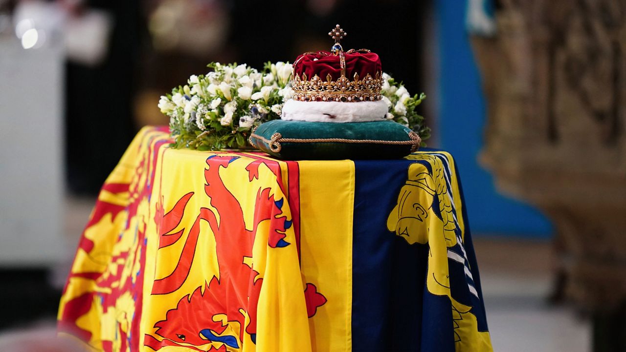 The Crown of Scotland sits atop the coffin of Queen Elizabeth II during a Service of Prayer and Reflection for her life at St Giles' Cathedral, Edinburgh, Monday, Sept. 12, 2022. (Jane Barlow/PA via AP)