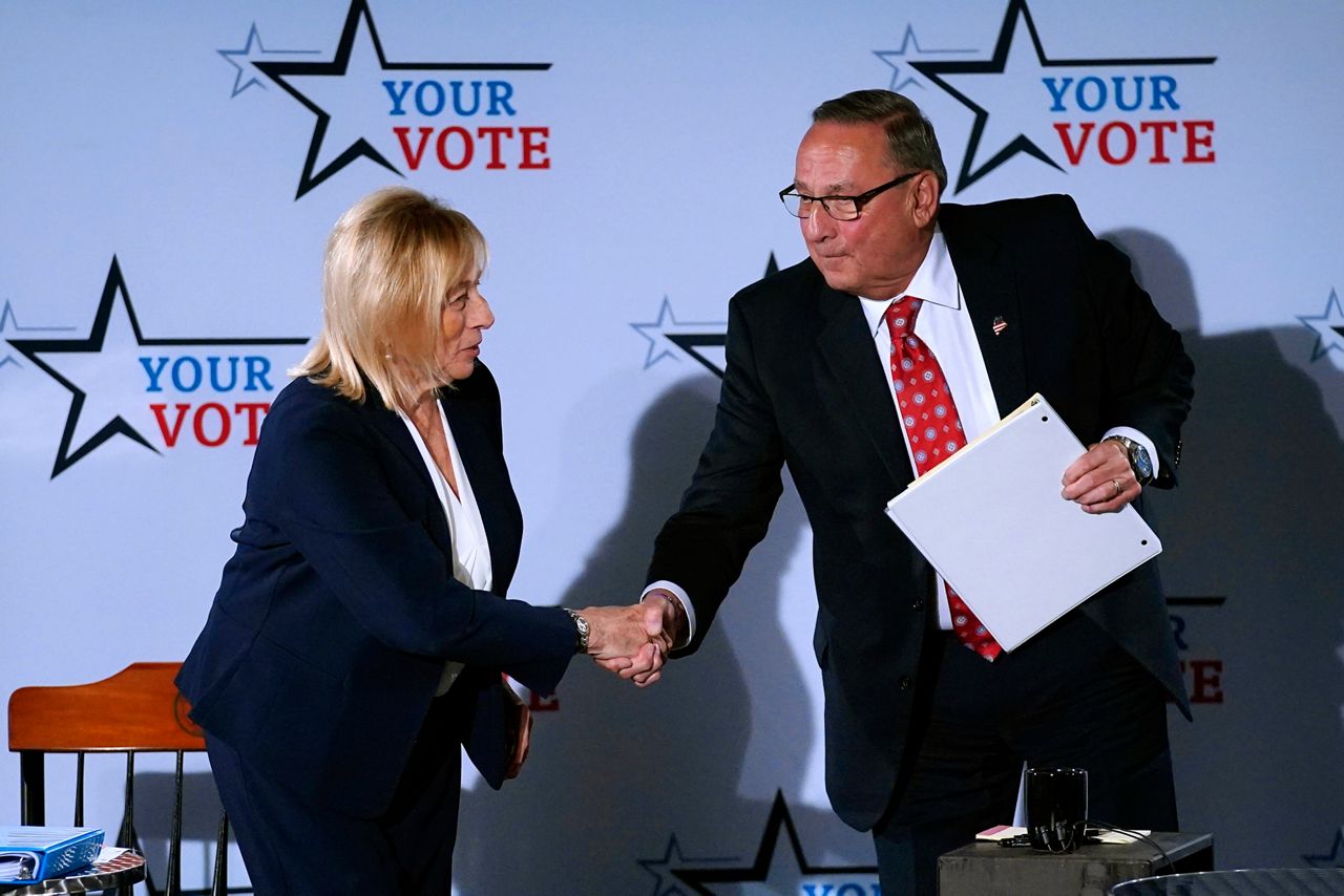 Gov. Janet Mills, left, and Mills’ then-challenger and former Gov. Paul Lepage at a debate in 2021. LePage has long-advocated for a raise in the governor’s $70,000 salary, something now under consideration in the Legislature. AP file photo