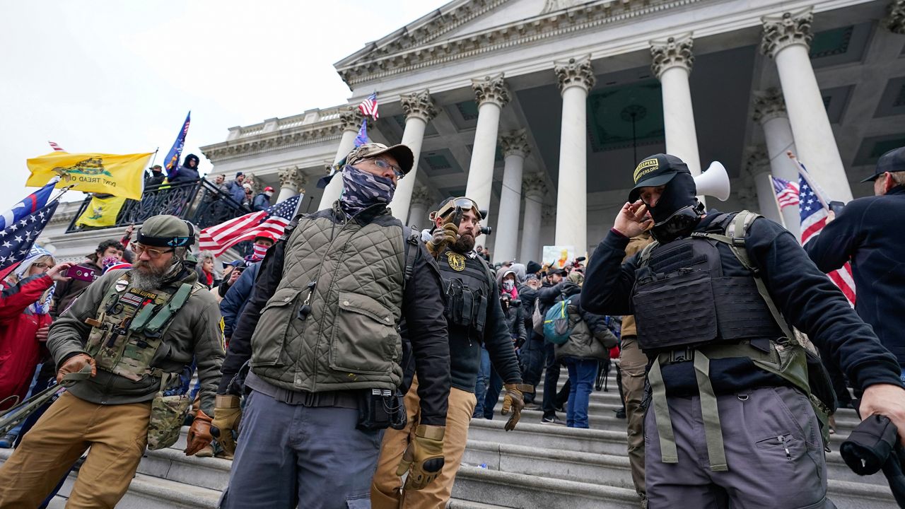 FILE - Members of the Oath Keepers on the East Front of the U.S. Capitol on Jan. 6, 2021, in Washington. (AP Photo/Manuel Balce Ceneta)
