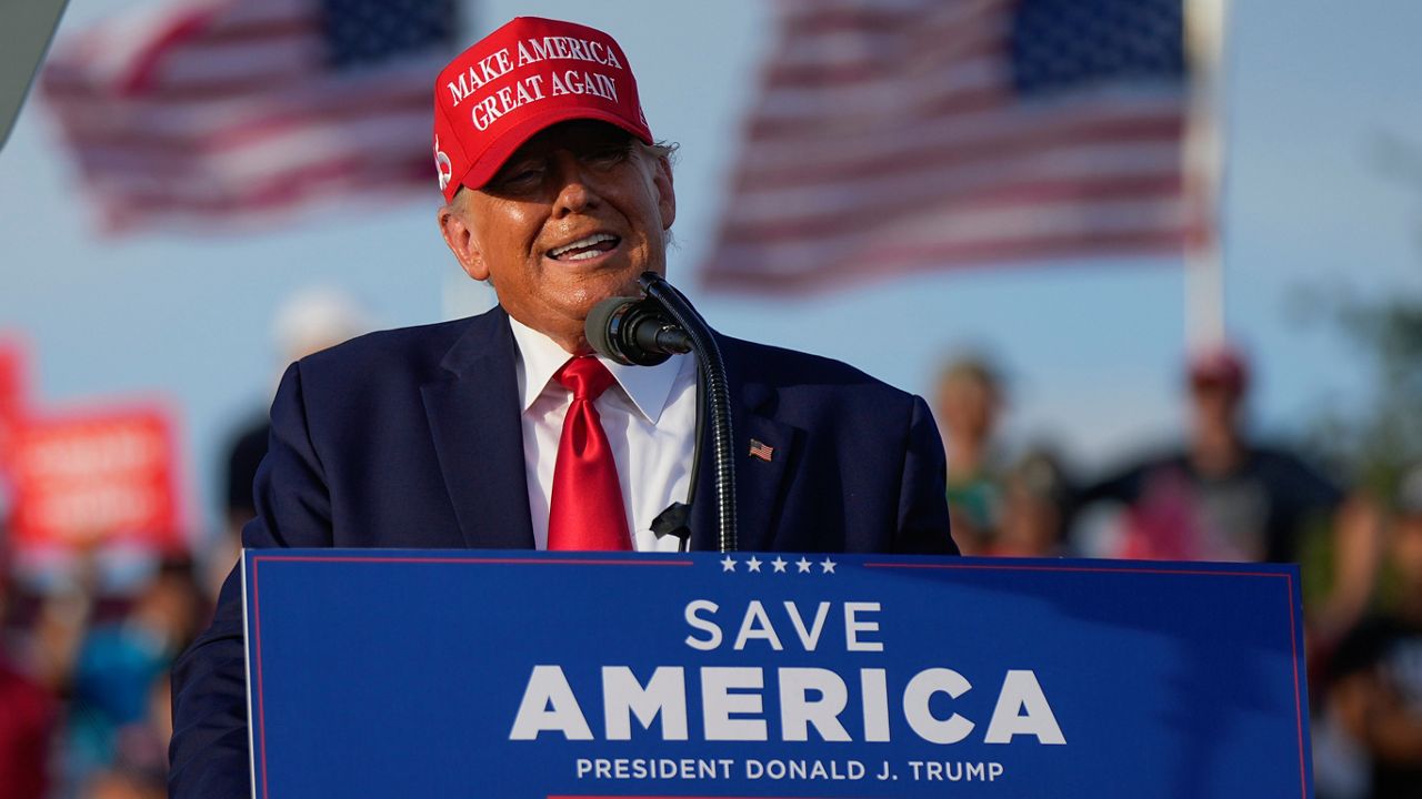 At Florida rally, Trump teases 2024 run