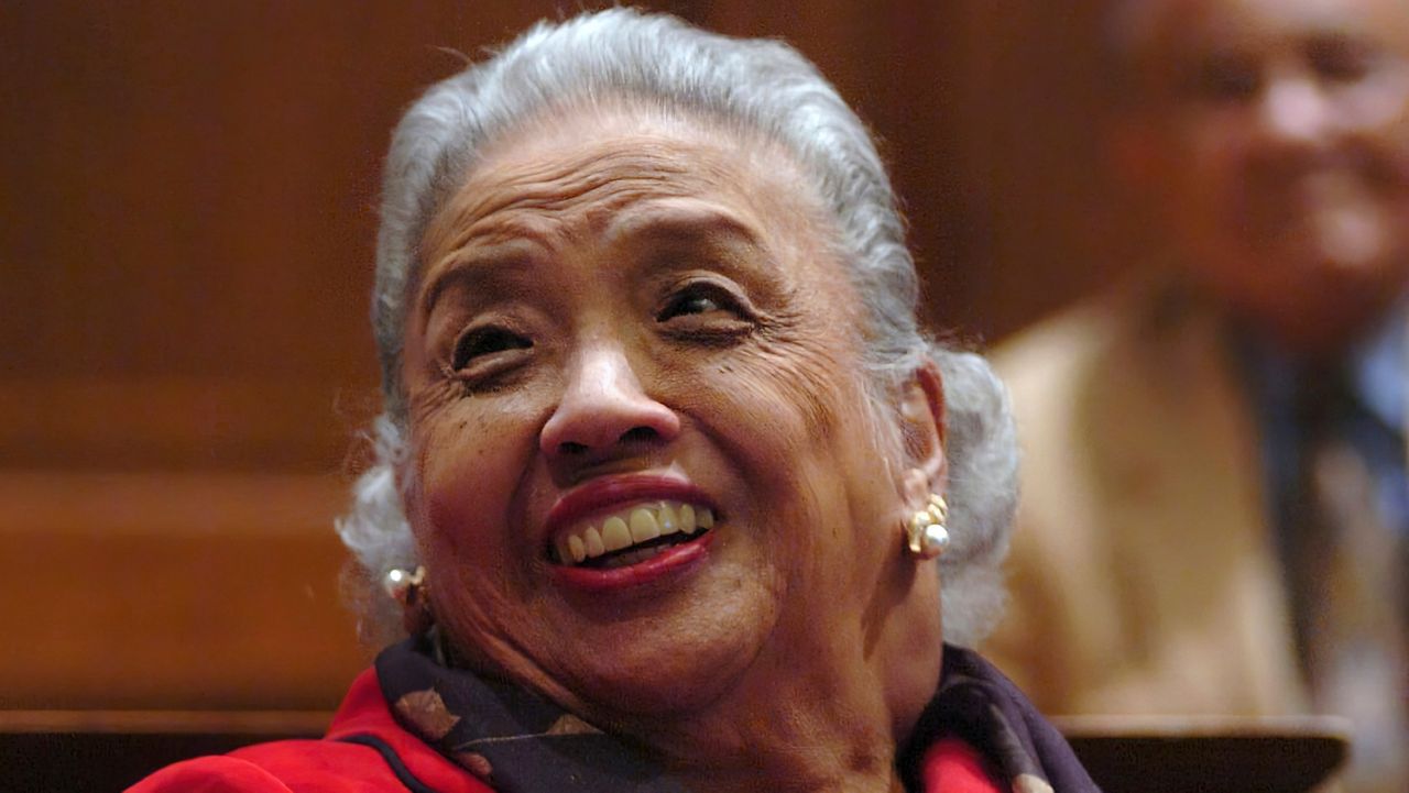 FILE - Cecilia Marshall, widow of Supreme Court Justice Thurgood Marshall, laughs while watching a slide show about her husband during a meeting to rally support for renaming Baltimore-Washington International Airport after Thurgood Marshall, one of the state's most famous native sons and the first Black justice on the U.S. Supreme Court, in Annapolis, Md., March 28, 2005. The Supreme Court says Cecilia "Cissy" Marshall has died. She was 94.(AP Photo/Matthew S. Gunby, File)