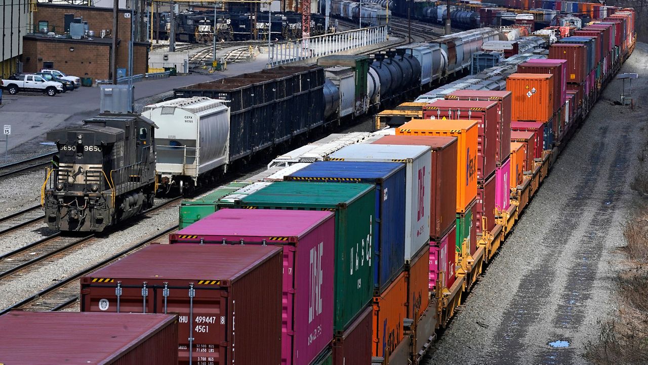 FILE - Freight train cars and containers at Norfolk Southern Railroad's Conway Yard in Conway, Pa., April 2, 2021. (AP Photo/Gene J. Puskar, File)