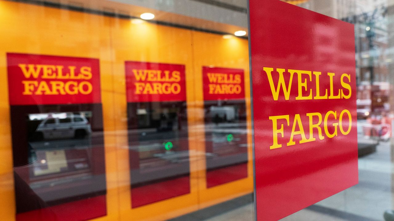 FILE - This Jan. 13, 2021 file photo shows a Wells Fargo office in New York. Wells Fargo reports earnings on Friday, Jan. 13, 2023. (AP Photo/Mark Lennihan, File)