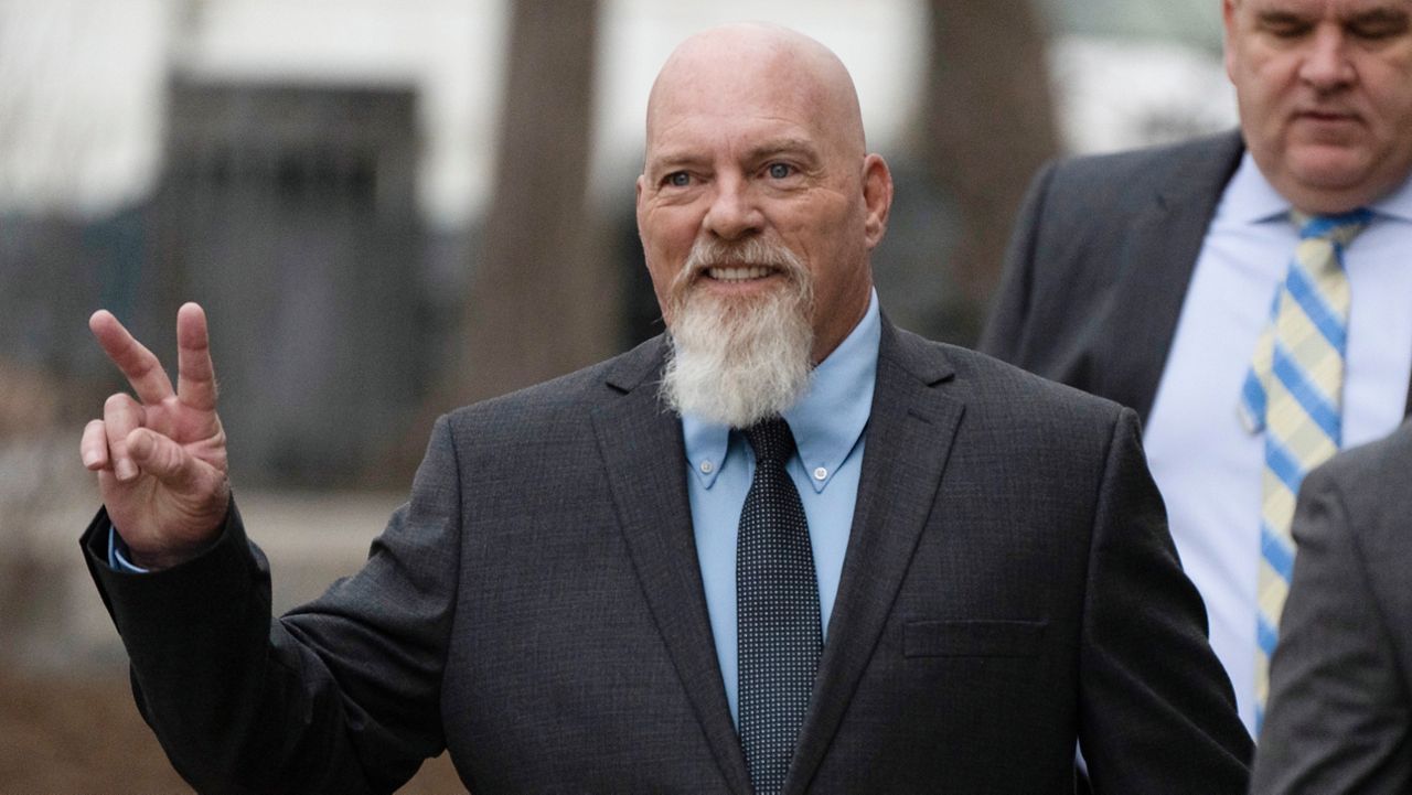 Richard Barnett, an Arkansas man who was photographed with his feet on a desk in House Speaker Nancy Pelosi's office during the Jan. 6 U.S. Capitol riot, arrives at federal court in Washington, Tuesday, Jan. 10, 2023. (AP Photo/Manuel Balce Ceneta)