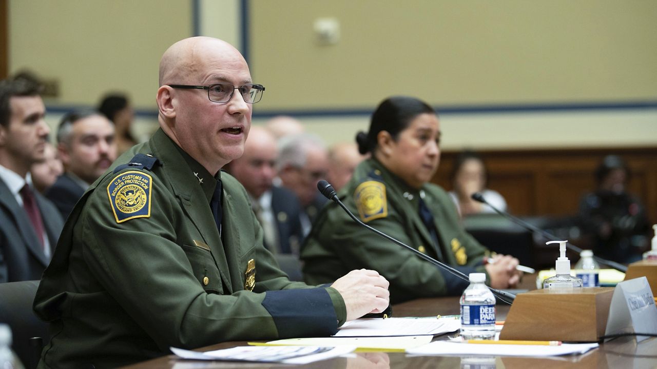 U.S. Customs and Border Protection Chief Patrol Agent John Modlin for the Tucson Sector, left, and U.S. Customs and Border Protection Chief Patrol Agent Gloria Chavez for the Rio Grande Valley Sector, right, testify before the House Committee on Oversight and Accountability on Tuesday, Feb. 7, 2023, in Washington. (AP Photo/Kevin Wolf)