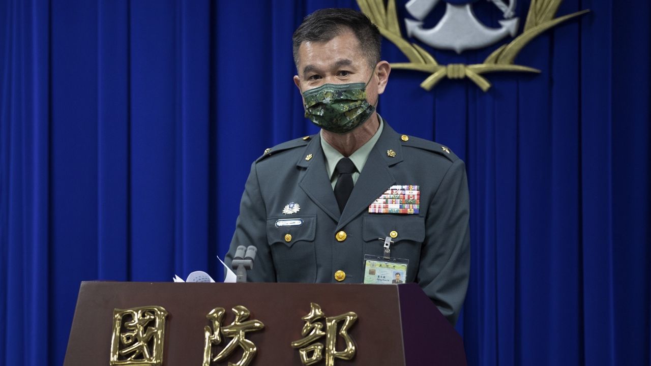 In this photo released by the Taiwan Ministry of National Defense, Major general Huang Wen-chi, the assistant deputy chief of general staff for intelligence speaks during a press conference in Taipei, Taiwan, Tuesday, Feb. 14, 2023. (Taiwan Ministry of National Defense via AP)