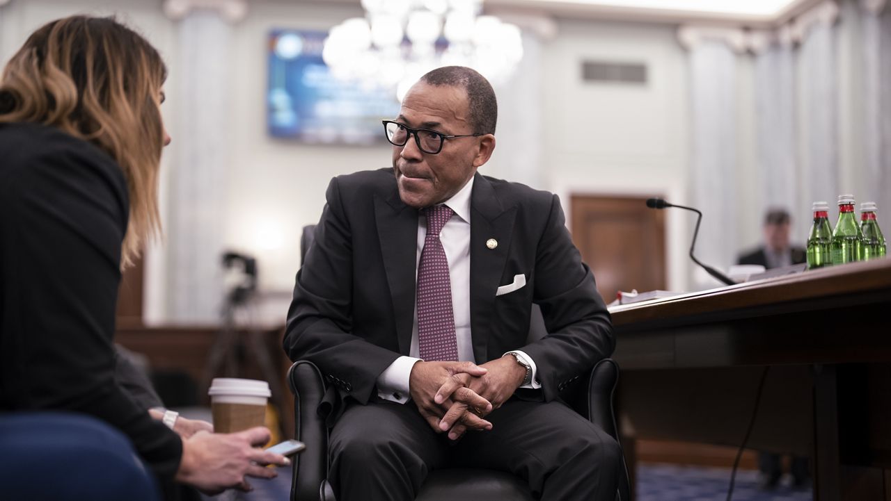 Acting Administrator of the Federal Aviation Administration Billy Nolen confers with his staff before testifying at the Senate Commerce, Science, and Transportation Committee as the panel examines recent failures in the FAA's NOTAM system, at the Capitol in Washington, Wednesday, Feb. 15, 2023. (AP Photo/J. Scott Applewhite)