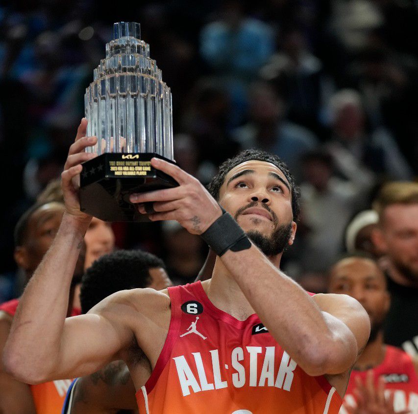 Team Giannis forward Jayson Tatum (0) holds up his MVP trophy after the NBA basketball All-Star game Sunday, Feb. 19, 2023, in Salt Lake City. (AP Photo/Rick Bowmer)