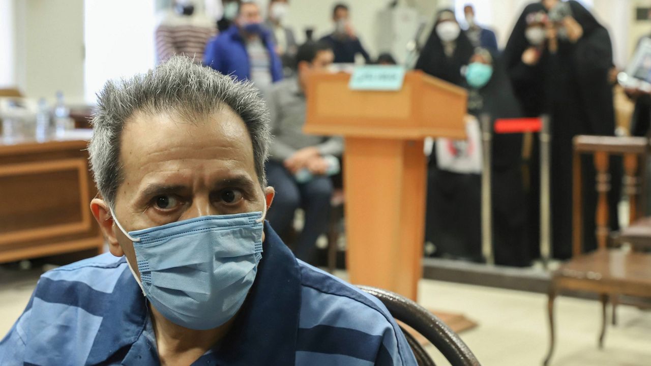 Iranian-German national and U.S. resident Jamshid Sharmahd attends his trial at the Revolutionary Court, in Tehran, Iran, Sunday, Feb. 6, 2022. Sharmahd, the senior member of a U.S.-based Iranian opposition group accused of orchestrating a deadly 2008 mosque bombing has been sentenced to death in Iran, authorities said Tuesday, Feb. 21, 2023.(Koosha Mahshid Falahi/Mizan News Agency via AP)