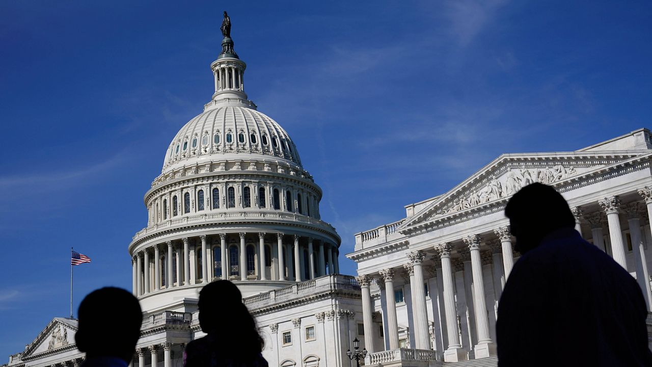 People walk outside the U.S. Capitol building in Washington on June 9, 2022. Members of the House and Senate were informed Wednesday, March 8, 2023, that hackers may have gained access to their sensitive personal data in a breach of a Washington, D.C., health insurance marketplace. (AP Photo/Patrick Semansky)