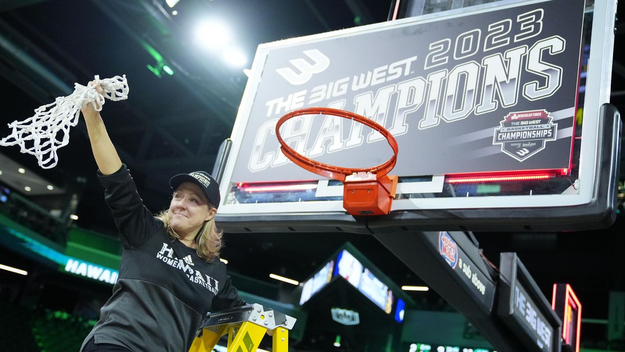 Hawaii coach Laura Beeman cut down the net at Dollar Loan Center for the second straight year, marking a first in program history.