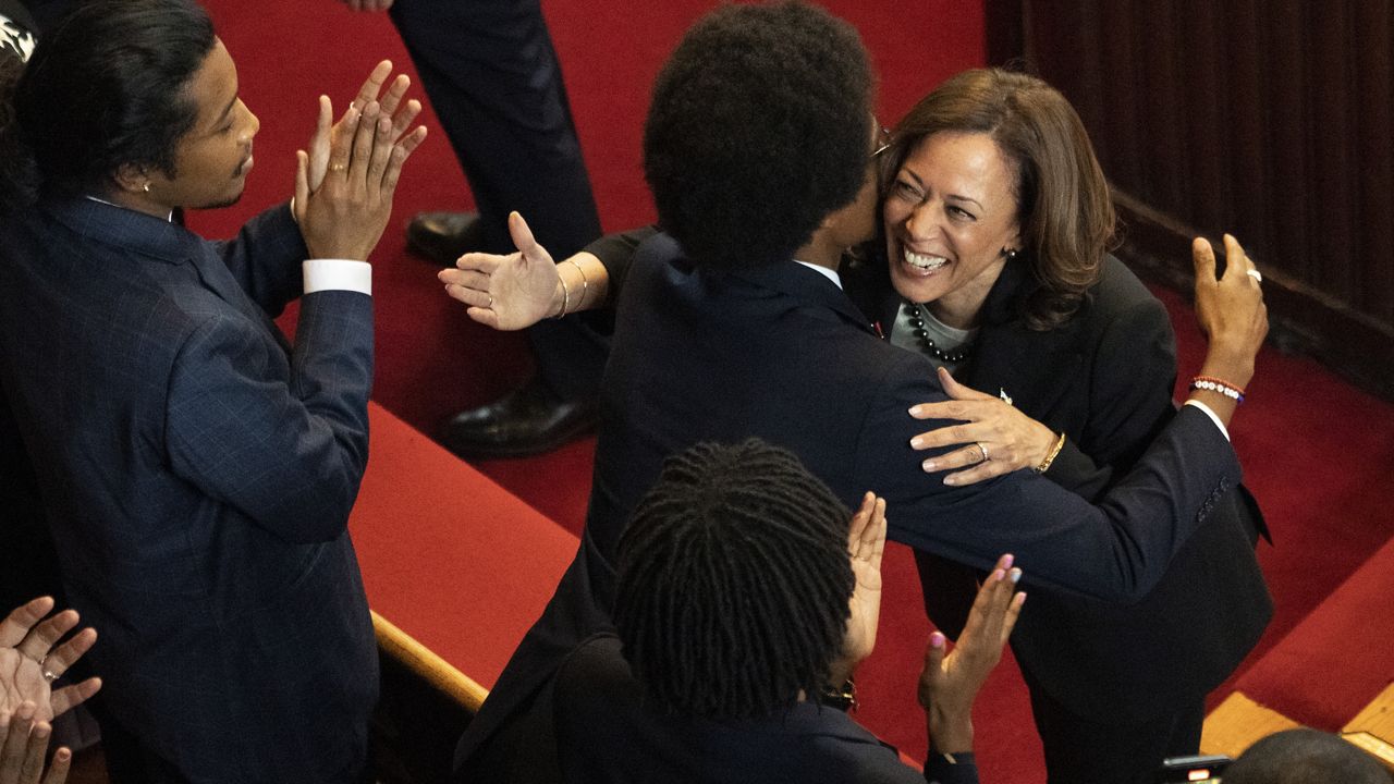 Vice President Kamala Harris hugs expelled Rep. Justin Pearson, D-Memphis, before Harris speaks at Fisk University, Friday, April 7, 2023, in Nashville, Tenn. (AP Photo/George Walker IV)